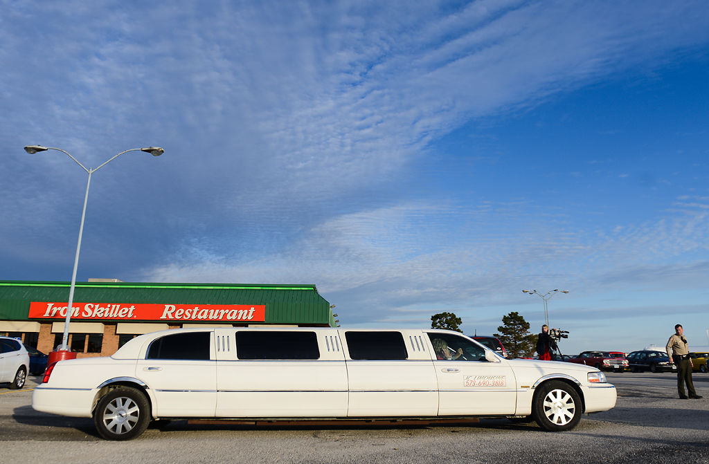 A white limo holding Wyatt Salmon and his family